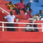 Governor Holiday and others enjoying the baseball game on Saturday afternoon. 