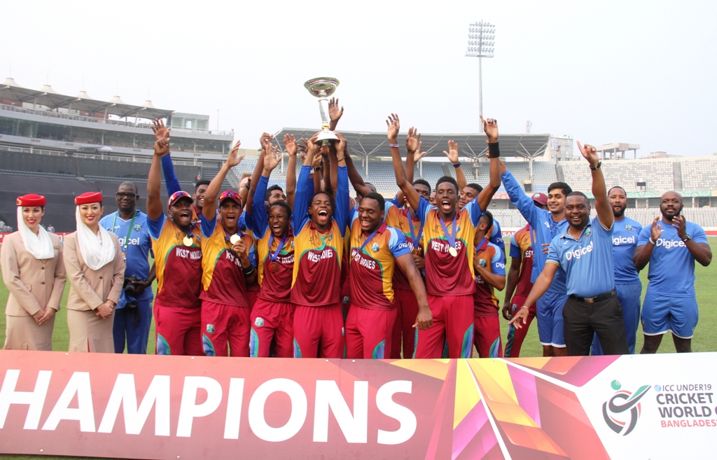 WI player celebrate with trophy.jpg image