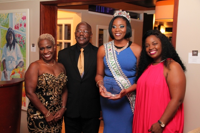L to R – Mrs. Gabrielle Marlin, Prime Minister William Marlin, Queens Crystal Award Recipient Miss Mature Norrisa Anatol, President Posh Productions Anna Rabess- Richardson